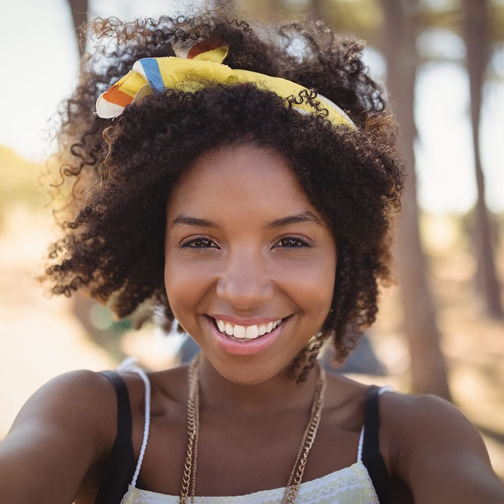 close-up-portrait-of-smiling-woman-2021-04-04-18-32-02-utc.jpg